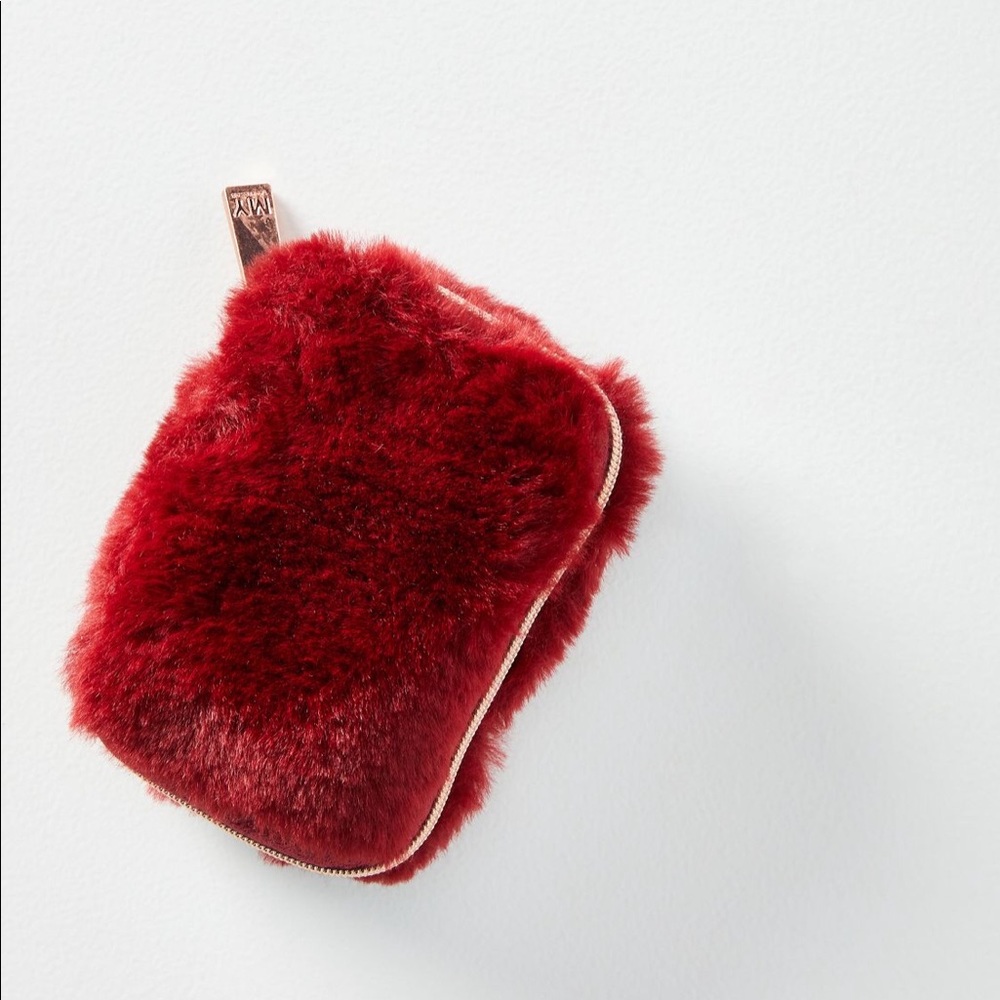 Anthropologie earbud and AirPod holder. Sold out.